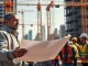 New York General Contractor overseeing bustling construction site activity in NYC.