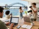 Engaging scene of airbnb management sydney with hosts optimizing rentals and reviewing bookings.