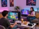 Players enjoying interactive sex games in a cozy living room, showing intense gaming and vibrant graphics.