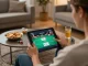 Engage in online gaming at https://play-hbet.com/ with a person enjoying a live poker game at home.