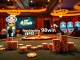 Experience the thrill of Nhà cái 98win at a vibrant casino table with poker chips and cards.