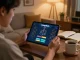 sungaitoto login interface displayed on tablet in a cozy home gaming environment.