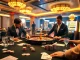 B52 casino scene with elegant poker table and high stakes gaming accessories.