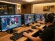 C168 online gaming experience with engaging live dealer session showcased on multiple screens