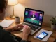 Engaging in live dealer blackjack on 789WIN's online platform, with a cozy gaming setup.