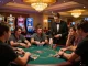 KP88 players enjoying poker at a vibrant casino table surrounded by chips and excitement.
