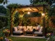 Couple enjoying evening under a 3D pergola in a lush backyard garden.
