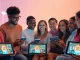 An engaging gathering exploring diverse nsfw ai platforms through modern devices, showcasing excitement and advanced technology.