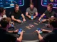 Players engaging in strategic poker gameplay on SHBET .COM with dynamic phone app interfaces visible.