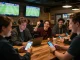 Bongdalu users engaging in mobile sports betting during live football matches, showcasing real-time results.