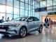 Traveling with a modern car at Gatwick airport terminal, showcasing convenience and style.