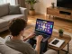 Gaming on TG88 platform with vibrant slots, cozy home setup and strategic elements.