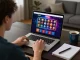 Engaging online gaming at Bomwin, showcasing strategic gameplay on laptop.