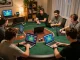 Players engaging in game bài at home with laptops and tablets, showcasing strategic moves in online gaming.