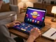 Player engaging with Ngonclub online casino app on tablet amidst cozy home environment