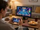 Engaging with the SV66 app during a home gaming session, showcasing a modern casino experience.