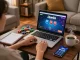 Player engaged in online gaming at home using LLwin app with casino interface.