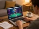 Player enjoying G28 online poker with strategy notes at cozy home setup