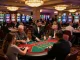 Playing a lively poker game at 23win casino with engaged players and vibrant atmosphere.