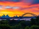 Showcasing Australia’s stunning skyline with Sydney Opera House at sunset.