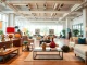Showcase of furniture accessories supplier featuring elegant lamps and decorative pieces.