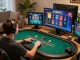 Player enjoying online blackjack at vt88 with multiple game screens in a cozy home office.