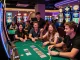 Excited friends celebrating a jackpot at the vibrant 399W casino, showcasing lively gaming atmosphere and fun.